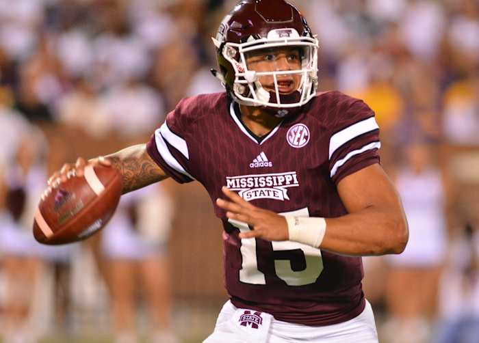 Mississippi State Bulldogs quarterback Dak Prescott (15) drops back to pass during the 2nd quarter of the game against the LSU Tigers at Davis Wade Stadium.